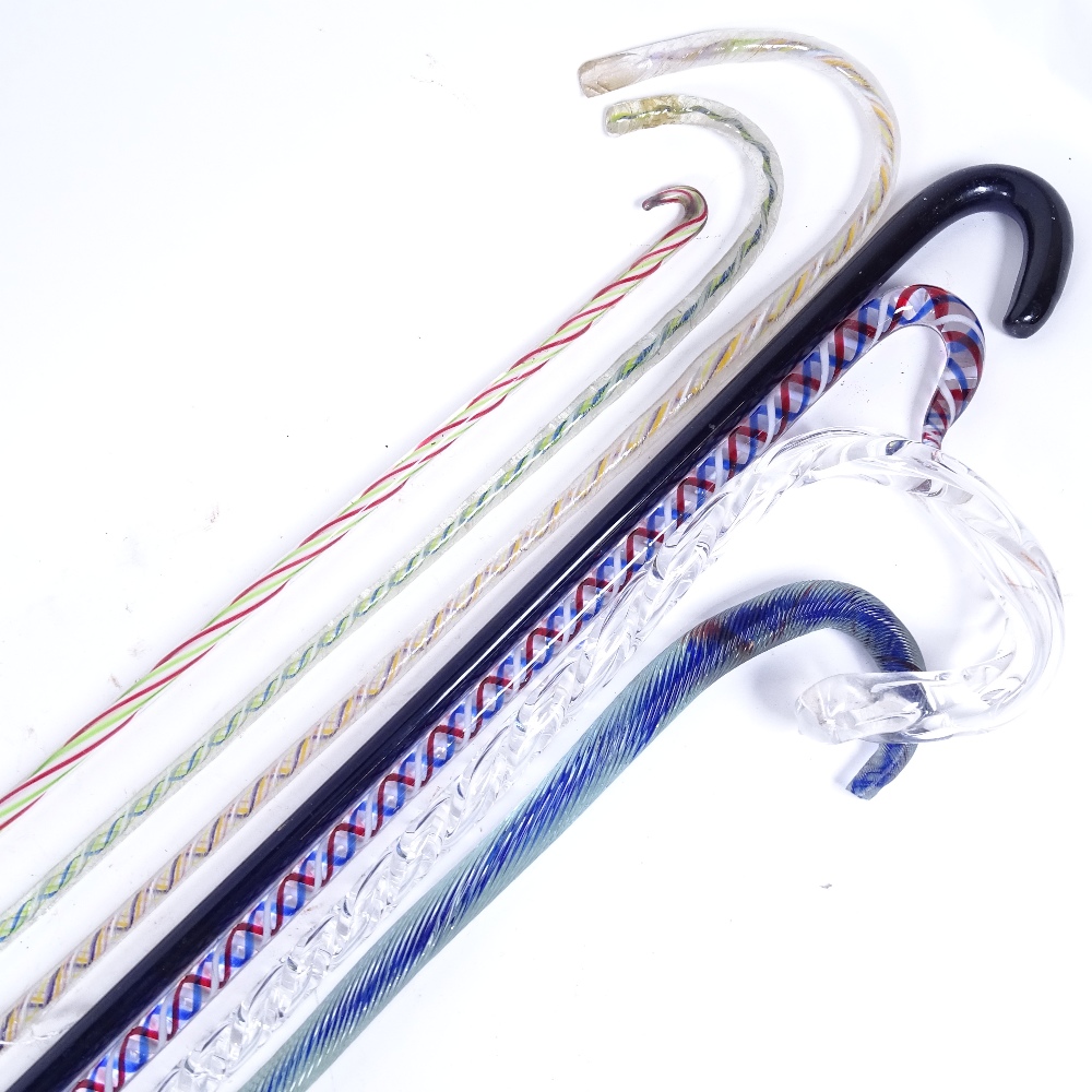 7 Victorian Nailsea type twisted glass candy cane walking canes, largest length 110cm (7)