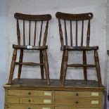 A pair of children's stick-back Windsor chairs