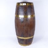 A coopered oak brass-bound barrel stick stand, height 63cm