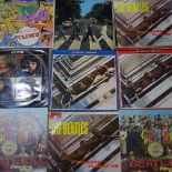 Beatles vinyl LPs and records, including Sgt Pepper, Help, and Abbey Road