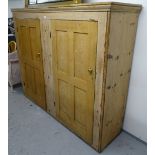 A large Antique pine 2-door cupboard, L184cm, H150cm, D47cm