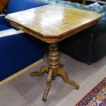 An Antique mahogany side table, the canted-corner top having inlaid marquetry and specimen scene, on