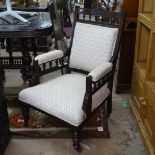 A late Victorian stained and upholstered open-arm parlour armchair