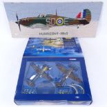 A Corgi Battle of Britain Spitfire and Messerschmitt diecast model plane set, and a hand embroidered