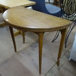 A 1940s utility marked walnut demilune fold over tea table, opening to reveal an ornate marquetry