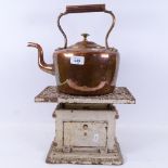 A Victorian copper kettle, height 26.5cm, and a Vintage cast-iron bathroom scale