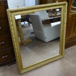 A 19th century gilt-gesso framed wall mirror, 80cm x 90cm