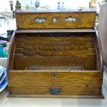 An oak tambour-front desk-top stationery cabinet with perpetual calendar, height 34.5cm