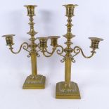 A pair of heavy brass Victorian candelabra, 36cm