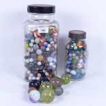 A large quantity of various marbles (3 jars)