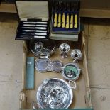 A tray of mixed plated ware, to include a pair of bud vases, cutlery, a bottle stand etc