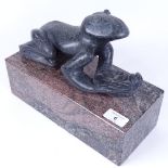 John Taulbut, soapstone sculpture, titled Just One Little Kiss, mounted on coloured marble base,