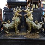 A pair of ornate gilded Dogs of Fo, with coloured decoration, H50cm