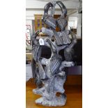 A large African soapstone carving, depicting toucans, H76cm