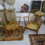 A pair of mid-century Ercol stick-back low armchairs (no cushions)