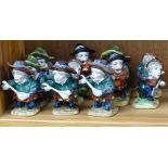 A group of 11 Continental porcelain Dickensian figures, height 9cm