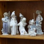 A collection of Lladro porcelain figures, largest height 20cm (9)