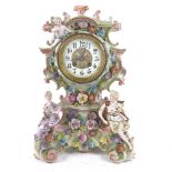 A 19th century figural and floral ceramic-cased 8-day mantel clock, by Kay's Ltd, case height 37cm