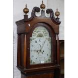 An 18th century 8-day clock, having a 12" arch-top painted dial with 2 subsidiary dials, dial signed