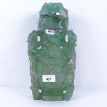 A large Chinese green fluorite jar and cover, relief carved and pierced bird and floral