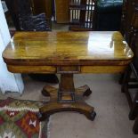 A Regency rosewood fold over card table, on a tapered centre column and platform base, W89cm, H71cm,