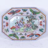 A Chinese octagonal hand painted ceramic plate, with butterfly surround and mark underneath,