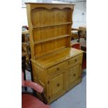 A modern polished pine 2-section dresser, W106cm, H180cm, D47cm