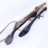 2 Antique carved mahogany shovel type spoons, and a bull whip, largest spoon length 46cm (3)