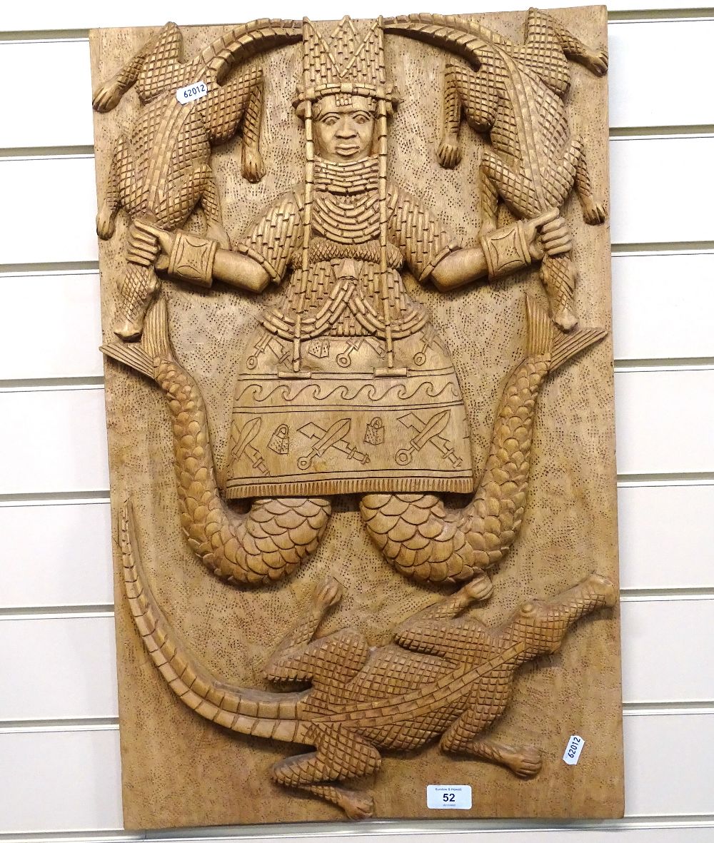 A large African Tribal Benin hand carved all hanging panel, depicting Queen Mother and crocodiles,