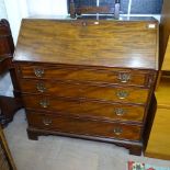 A George III mahogany bureau, the fall-front revealing a drawer and pigeon hole fitted interior, 4