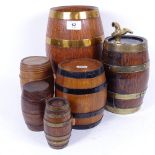 A group of coopered oak barrel containers, including Whisky barrel with brass tap, largest length