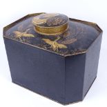 A reproduction Toleware caddy of canted rectangular form, with hand painted gilded exotic birds,