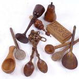 Various interesting turned wood items, including Welsh loving spoons, finial bottle stopper,