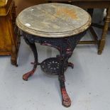 A circular embossed and painted cast-iron pub table, W58cm, H72cm