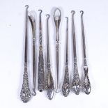 8 large silver-handled button hooks