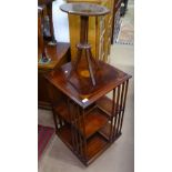 A crossbanded mahogany revolving bookcase, with marquetry decoration, W50cm, H83cm, and a small