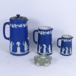 A graduated set of 3 Wedgwood Blue Jasper jugs, largest height 23cm, and a small green Jasper box