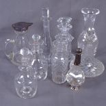 A group of small glass scent bottles, silver-topped jug etc