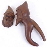 A 19th century carved wood Black Forest figural nutcracker, engraved Adel Boden, and a similar