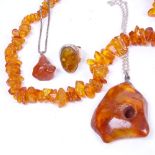 2 Baltic amber and silver-mounted pendant necklaces, an amber necklace, and a silver and amber set
