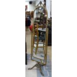 A decorative gilt-metal framed cheval mirror, on cherub decorated tripod base, H140cm