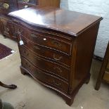 A reproduction crossbanded mahogany bachelor's chest of serpentine form, with brushing slide and 4