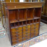 A Victorian mahogany filing/collector's cabinet, with open pigeon holes above 15 short fitted