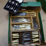 A tray of mixed plated cutlery