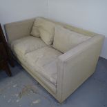 A small 2-seater upholstered settee