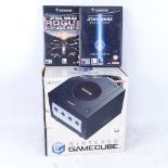 A Nintendo Gamecube with 1 controller and 2 Star Wars games