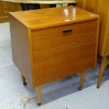 A mid-century teak cabinet of small size, with fall-front, W60cm, H70cm, D40cm