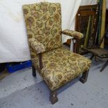 An Antique style upholstered open armchair