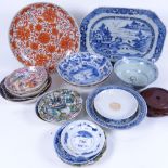 A large quantity of various Oriental ceramics, including blue and white bowls (some circa 1700),