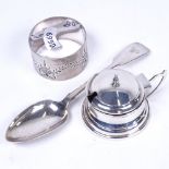 A small silver mustard pot with blue liner, engraved silver napkin ring and a silver teaspoon
